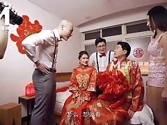 Sweet asian teenager gets shared by two lustful guys in sofa after the wedding