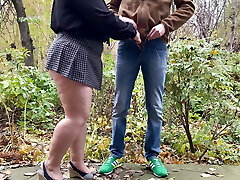 Cougar's new blue panties under a short miniskirt outdoors