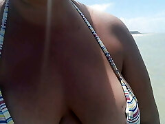 Sploog on the beach near the canoeist