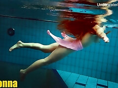 Simonna is molten and horny in the public swimming pool