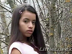 Lil Lupe masturbates her tight pussy in the woods