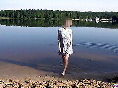 Nudist Damsel Goes Skinny Dipping in a Beach