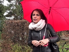 Slender model Nikita stretches her long legs to ride a wood in the van