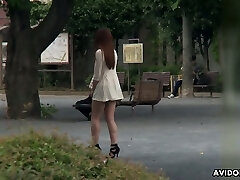 Lovely Japanese chick Ai Koda gives a blowjob in the car in wide daylight