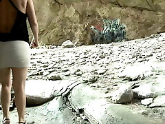 Horny mature in high heels has orgy with stranger on beach
