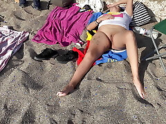 A follower paws my twat on the beach and I masturbate him