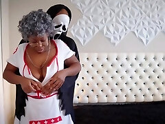 Mature ebony in a nurse uniform gets plowed by a Bbc in mask