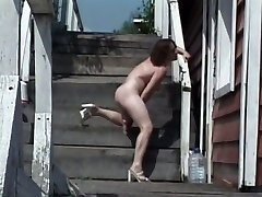 Truly naughty nympho uses a dildo to pet her wet pussy right outdoors