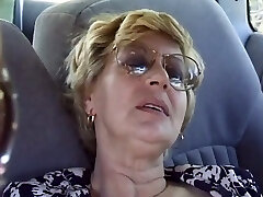 Mature Pauline frigs her old honeypot in a car and gets fucked