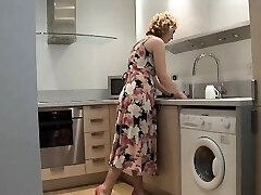 Mature blonde in stocking dildos her sweet cunt