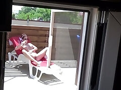 Covert webcam caught my neighbor masturbating outdoor in the pool sunbed Covert webcam caught my neighbor masturbating outdoor in the pool sunbed