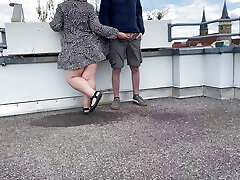 Super-sexy pissing mother-in-law helps son-in-law piss on the top of the parking lot