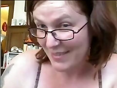 Short haired mature nerdy bitch showcases her ugly tits and huge ass