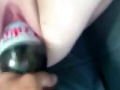 Shoving a plastic bottle in her phat loose pink cunt Shoving a plastic bottle in her phat loose pink cunt