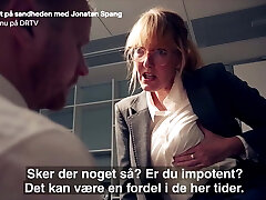 Danish mature Ditte Hansen pretends to slurp nipple in skit