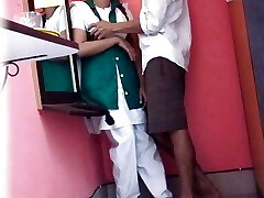 New Indian school girl nailing with her teacher