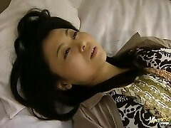 Horny Japanese woman masturbates and gets toyed