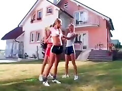 Girls in Adidas glisten shorts and sports shoes