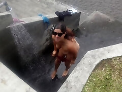 A Curvaceous Girl Gets Downright Changed And Takes Naked A Shower Outdoors On The Beach