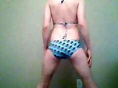 Shy Crossdresser in Blue Swimsuit