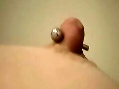 My buddy's Gf called Anne gets her ultra-cute puffy nipples pierced