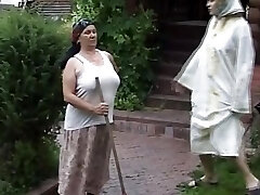 A sexy German grannie and teen getting their fuckholes smashed by three cocks