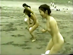 japanese nude nymphs ball playnig on the beach