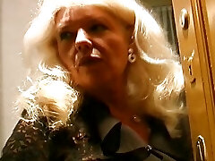 Old and busty German grandmother in stocking enjoys making a cock cum