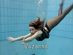 Zuzanna is swimming in stockings in the pool
