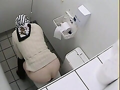 Granny got her ass on toilet voyeur flick while pissing
