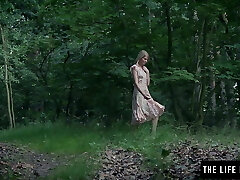 Skinny lady fucks herself hard in the forest