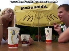 Mature arches over for doggy fuck in public