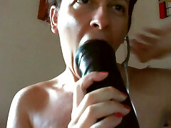 Huge dildos all in her wide open backside and pussy