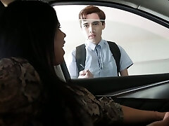 Young man catches a warm MILF tugging in her car and things turn sexual