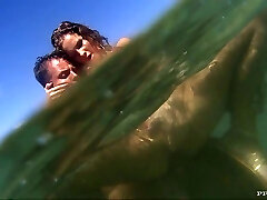 He sticks his manhood in her muff under water
