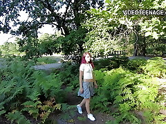 College-aged year cute girl outdoor with mini skirt