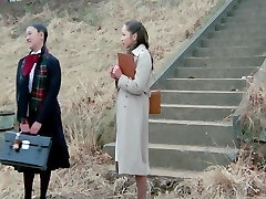 Female Tutor In Front Of The Students1982