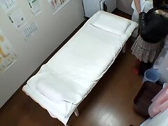 Fat booty Japanese caught in a voyeur massage video