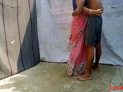 Indian fucks her neighbor in standing doggy-style