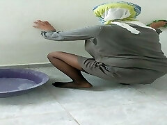 Hijab gal cleaning kitchen