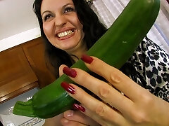 Obese mature stuffs everything in her ass and pussy