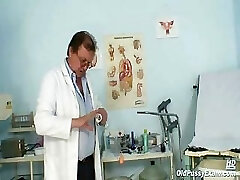 Old lady Mila visiting gyno doctor for poon speculum examination on gynochair