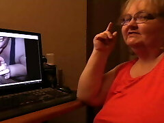 She is looking at her fellating