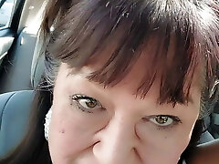 Mature Latina Granny with hairy pussy and big clit peeing outside truck wash