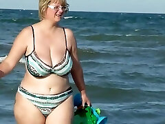 chubby mother spied on the beach