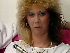 Mature Pierced Blond in Stockings