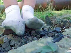 Cute amateur eyes rolling in nylon knee socks and white socks teasing you closeup outdoor