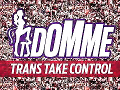 Brunette shemale in leather outfit strokes her big cock