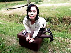 Purple dildo and black stockings