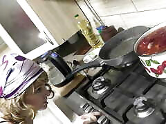 Sexy MILF in transparent negligee without panties and bra in kitchen preparing borscht. Fetish. Natural Tits. Pussy. Ass. Wife